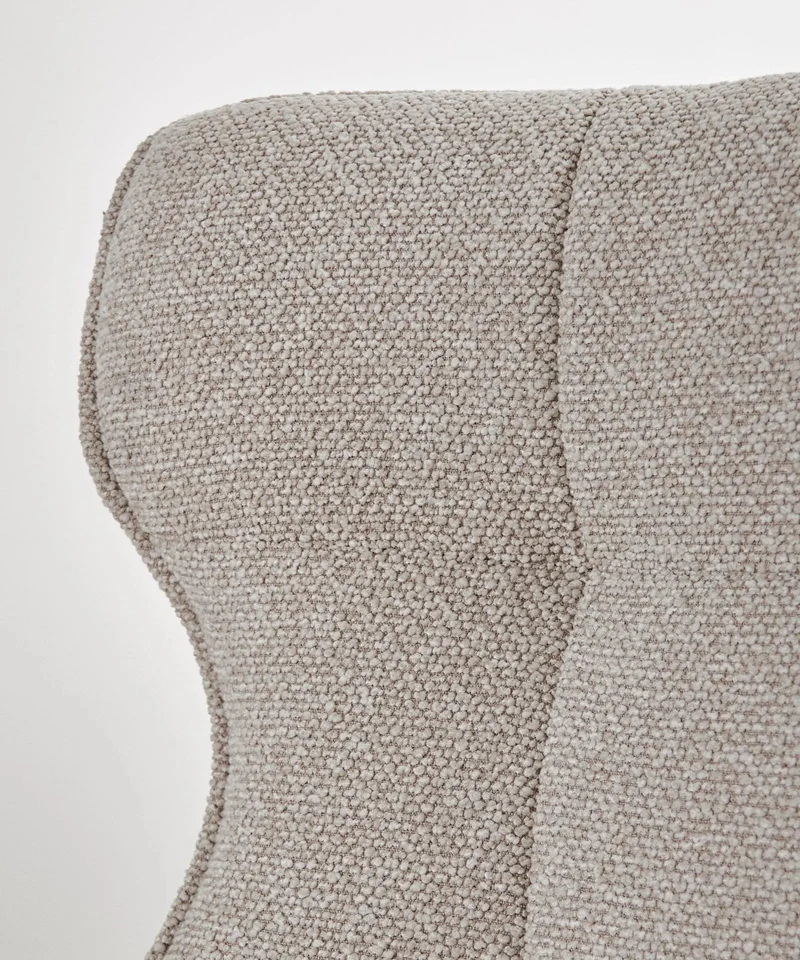 Sillón tapizado en tela bouclé Elsa