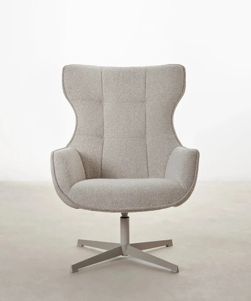 Sillón tapizado en tela bouclé Elsa