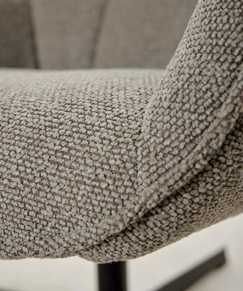 Sillón tapizado en tela bouclé Elsa