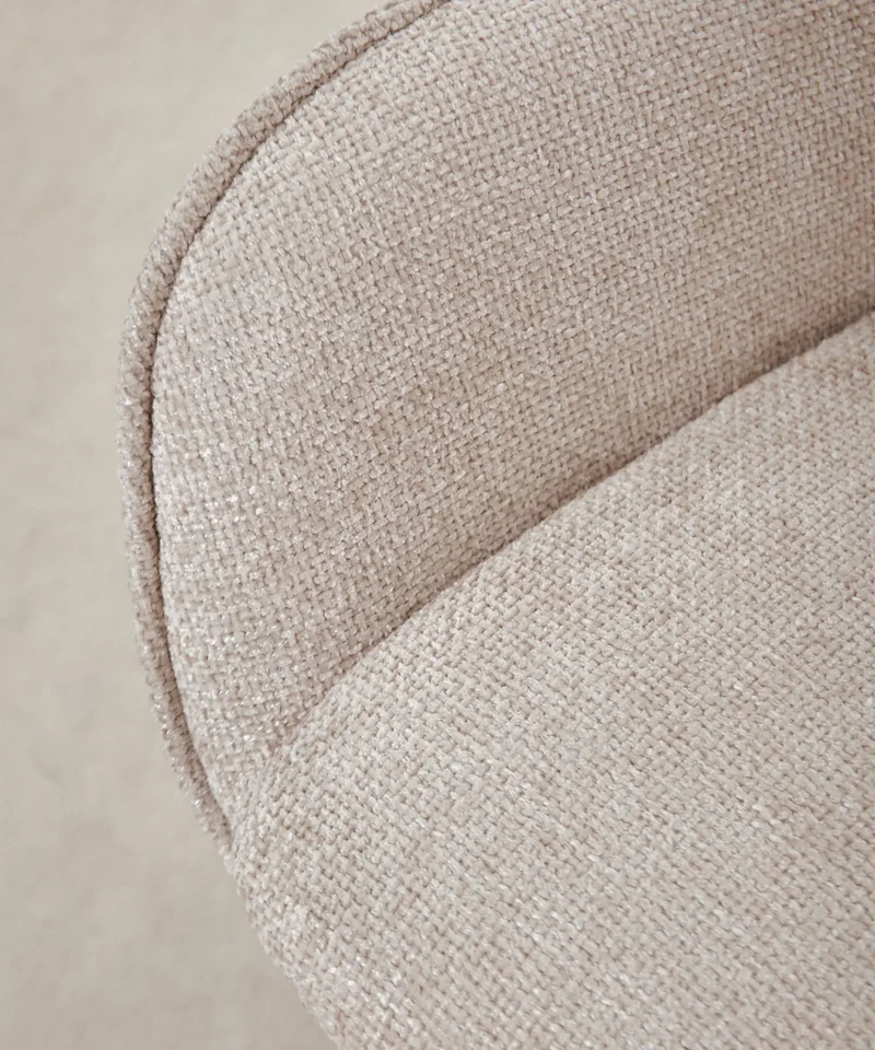 Sillón giratorio en tejido suave Norden