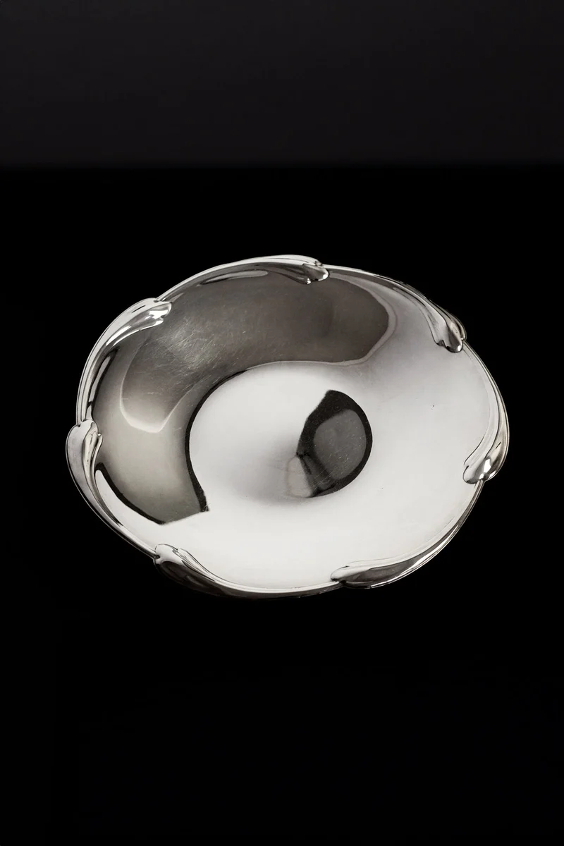 Large silver-plated dish with scaled rim