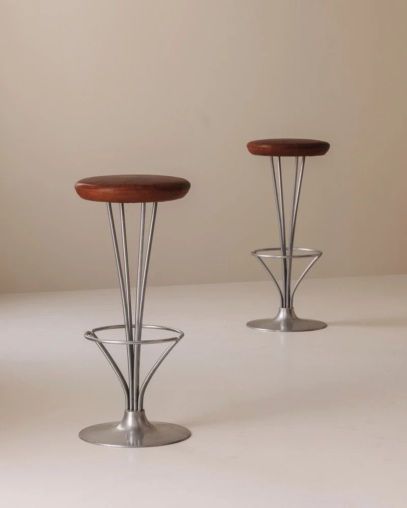Set of Two Bar Stools in patinated leather by Piet Hein for Fritz Hansen, Denmark, 1960s