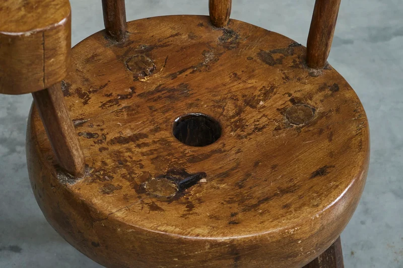 A Sculptural Three-Legged Provincial Vernacular Chair in Heavy Solid Oak France Early 20th Century