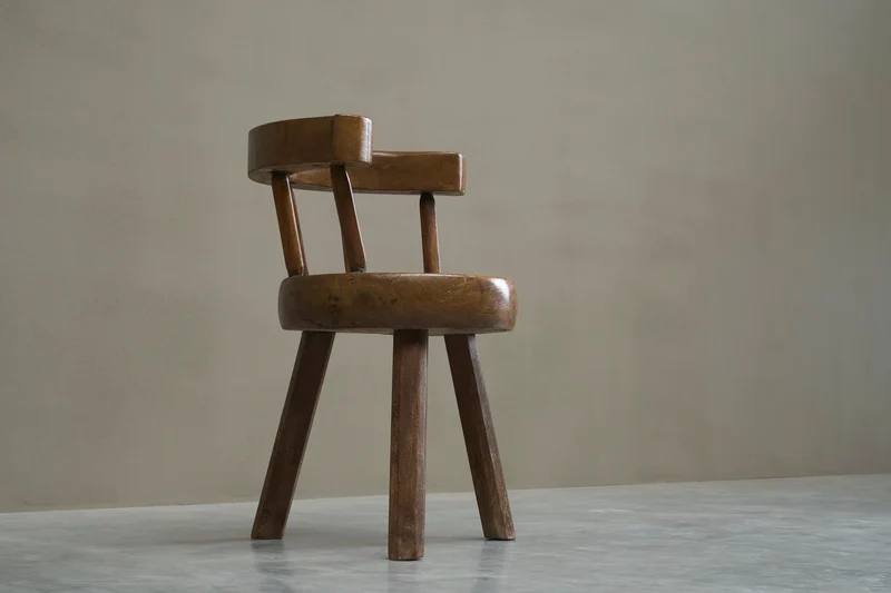 A Sculptural Three-Legged Provincial Vernacular Chair in Heavy Solid Oak France Early 20th Century