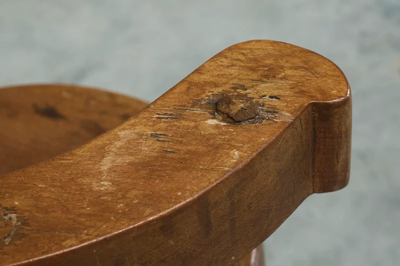 A Sculptural Three-Legged Provincial Vernacular Chair in Heavy Solid Oak France Early 20th Century