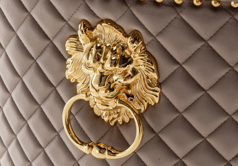 Chaise capitonnée velours moka tête de lion dorée - Lion x2