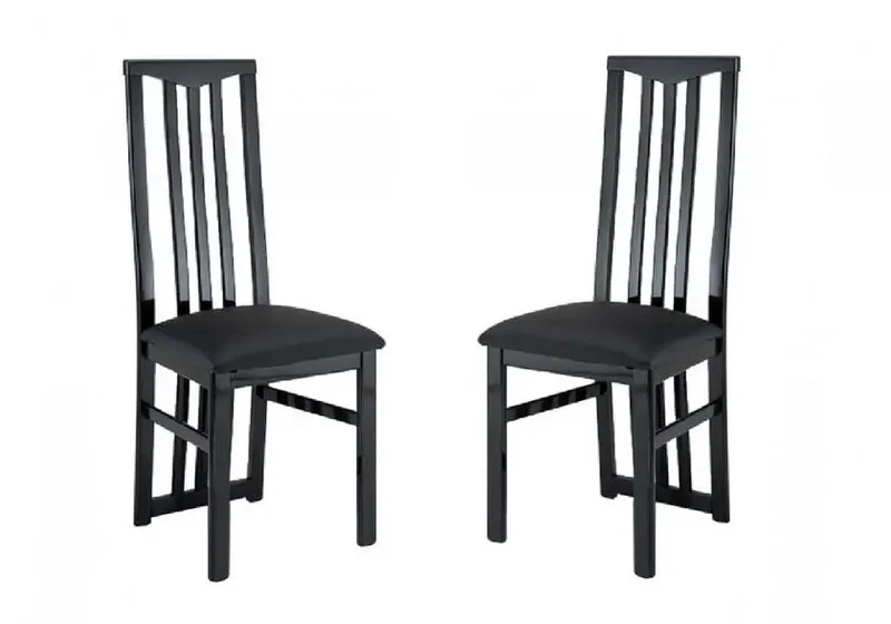 Lot 2 chaises laquées noir CX