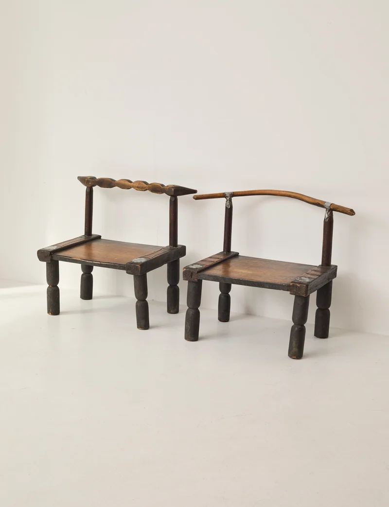 Small artisanal vintage West African chair "Baoulé" in solid wood C. 1960