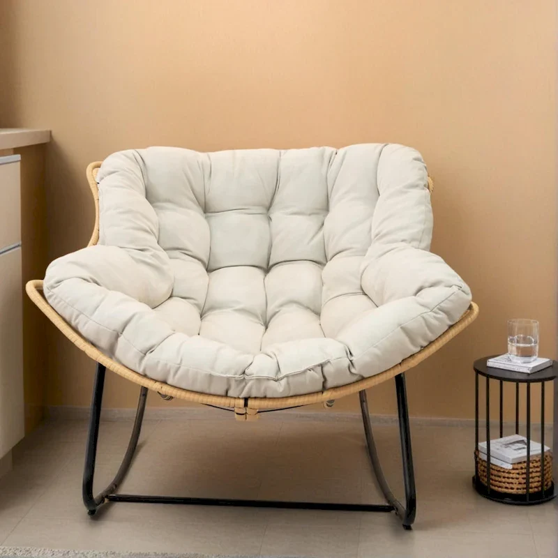 Fauteuil à bascule en rotin tressé gris foncé avec coussins et structure en métal