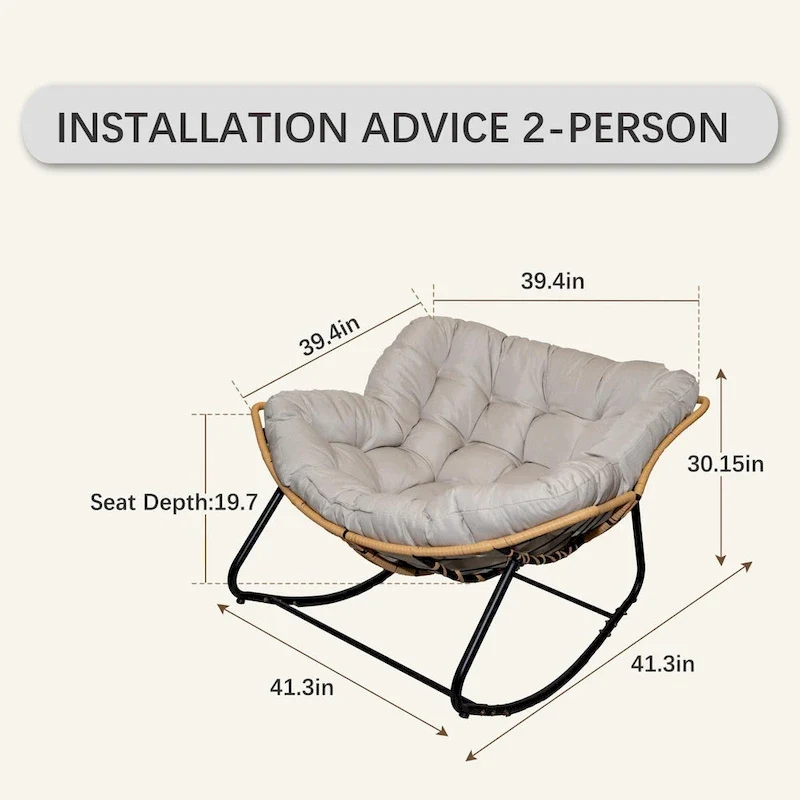 Fauteuil à bascule en rotin tressé gris foncé avec coussins et structure en métal