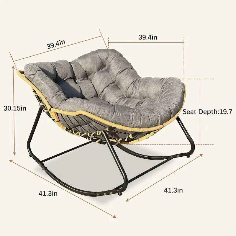 Fauteuil à bascule en rotin tressé gris foncé avec coussins et structure en métal