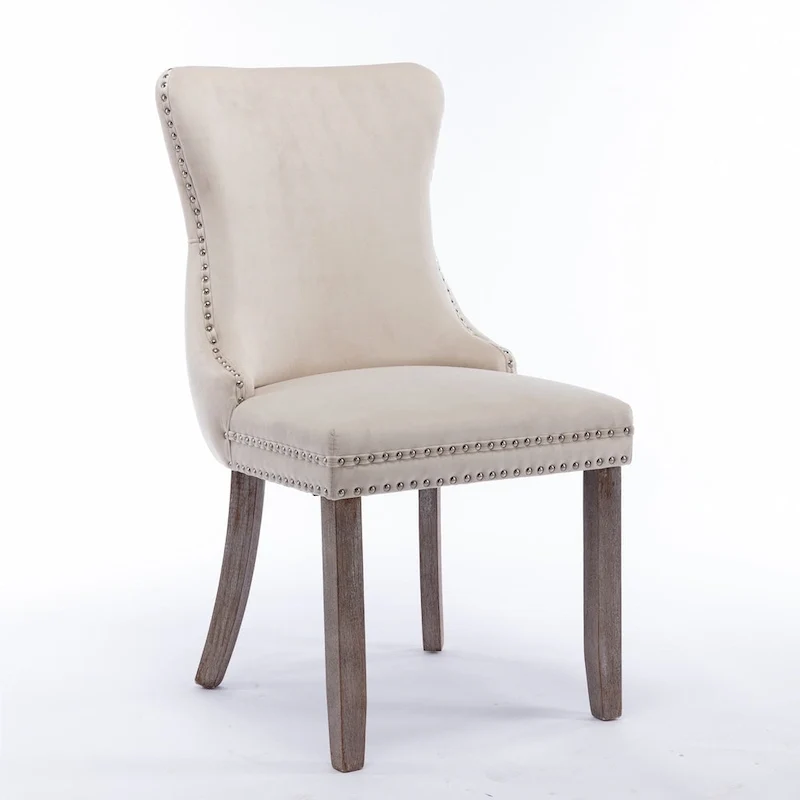Chaise de salle à manger capitonnée en velours avec dossier à oreilles et clous décoratifs