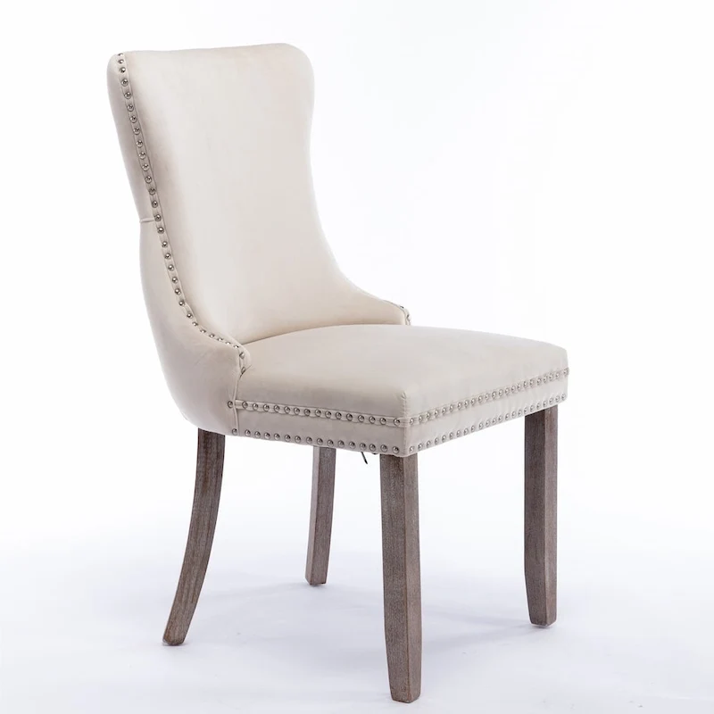 Chaise de salle à manger capitonnée en velours avec dossier à oreilles et clous décoratifs