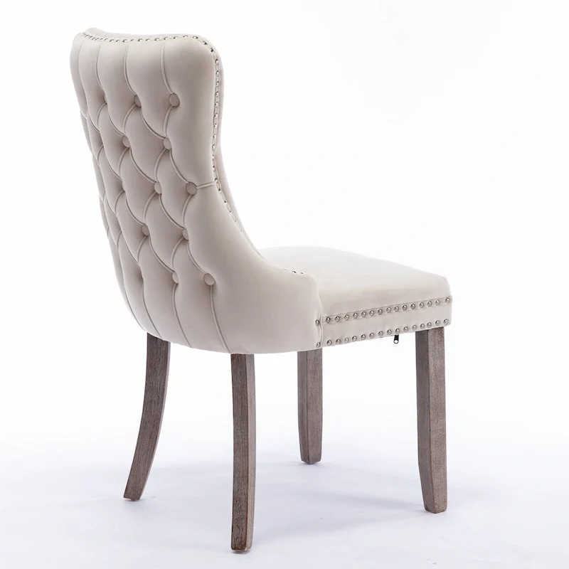 Chaise de salle à manger capitonnée en velours avec dossier à oreilles et clous décoratifs