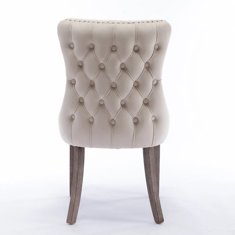 Chaise de salle à manger capitonnée en velours avec dossier à oreilles et clous décoratifs