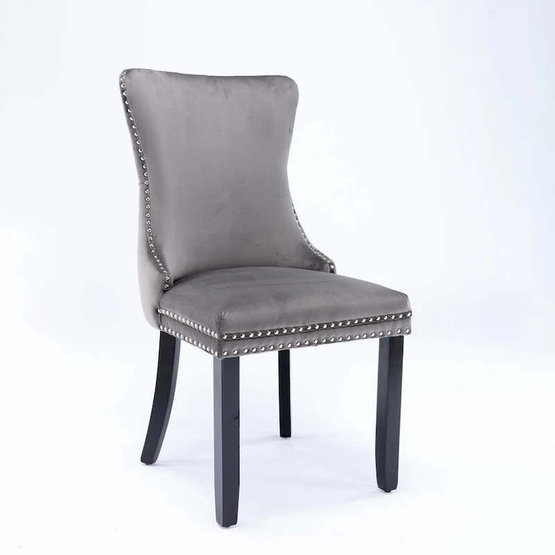 Chaise de salle à manger capitonnée en velours avec dossier à oreilles et clous décoratifs