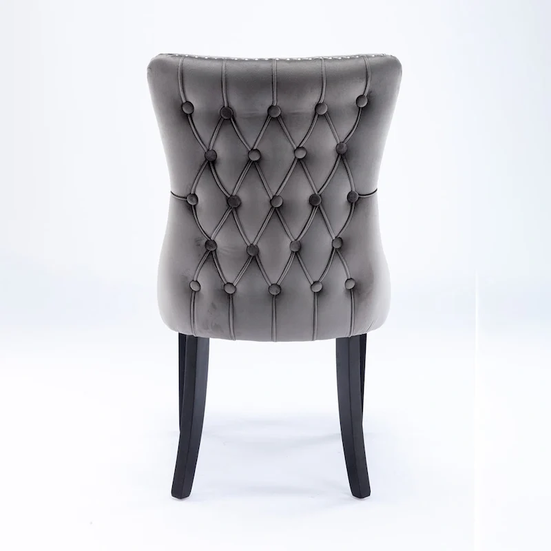 Chaise de salle à manger capitonnée en velours avec dossier à oreilles et clous décoratifs