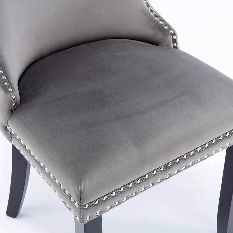 Chaise de salle à manger capitonnée en velours avec dossier à oreilles et clous décoratifs