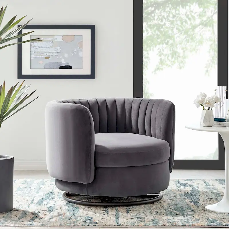 Fauteuil pivotant en velours capitonné avec dossier cannelé et base en métal noir