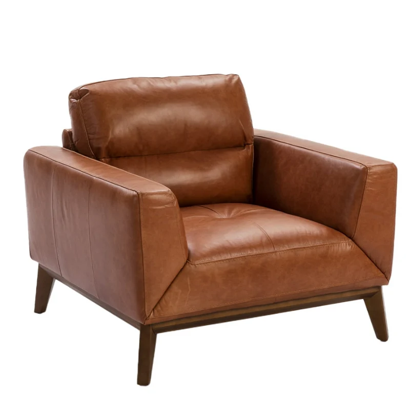 Fauteuil en cuir marron et pied en bois Angel Cerda