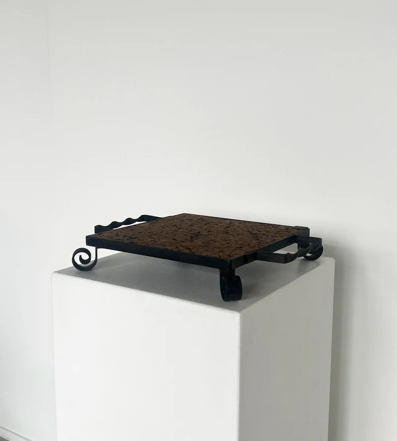 Cork and cast iron display plate