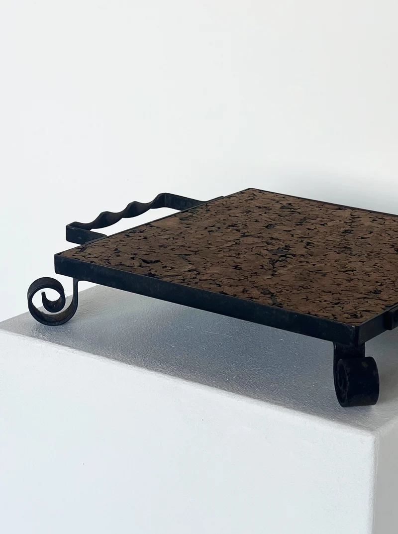 Cork and cast iron display plate