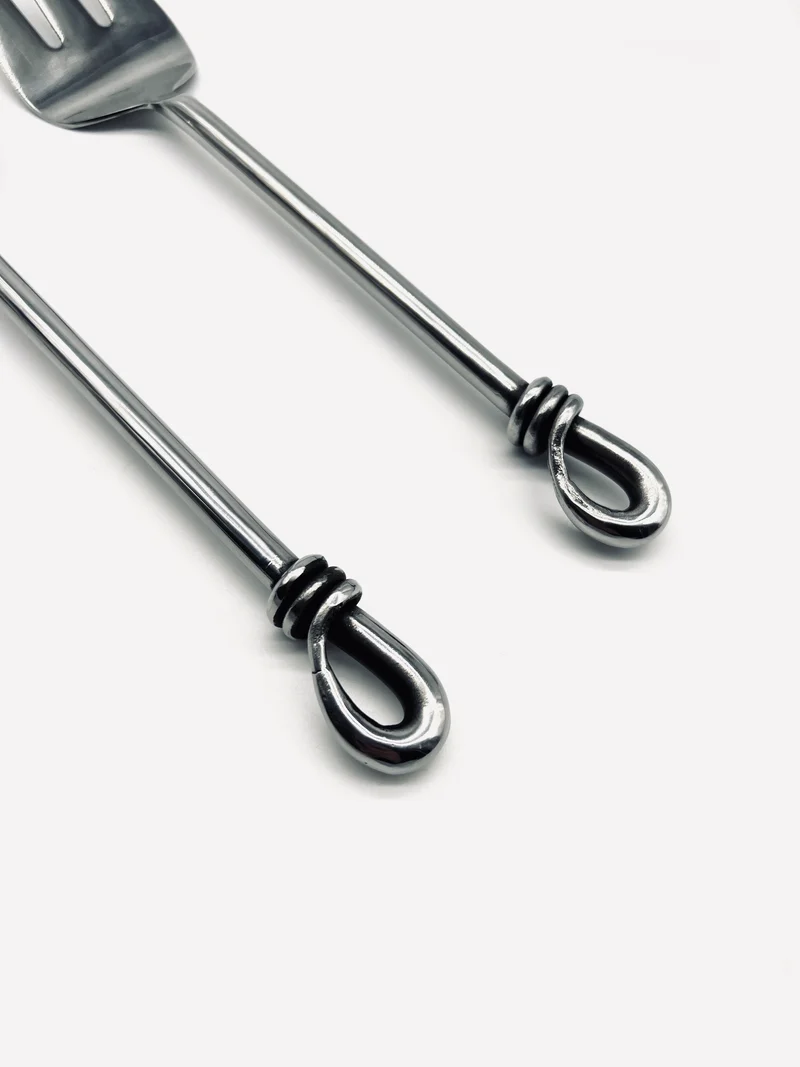 Vintage two salad servers in stainless steel