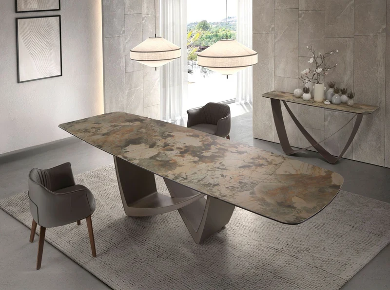 Table de salle à manger à rallonge ovale tonneau marbre porcelaine et acier taupe métallisé 1152 Angel Cerdá