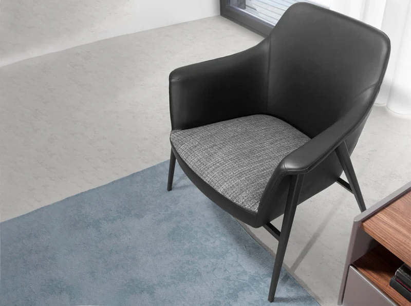 Fauteuil en tissu et cuir écologique tapissé avec structure en acier noir 5080 Angel Cerdá