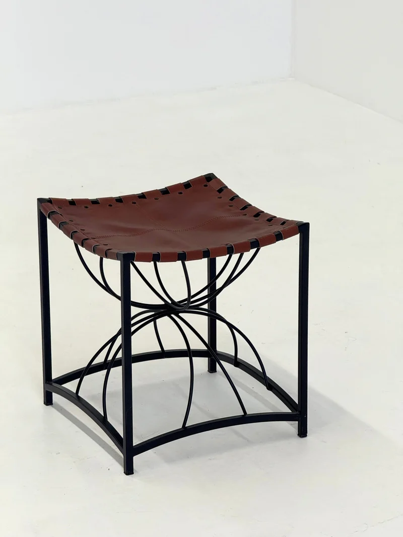 Elegant vintage French stool with black metal and brown leather