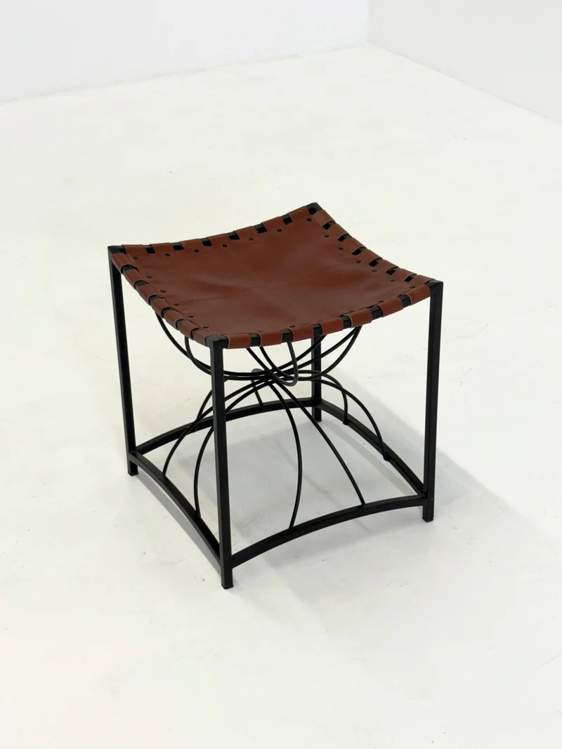 Elegant vintage French stool with black metal and brown leather