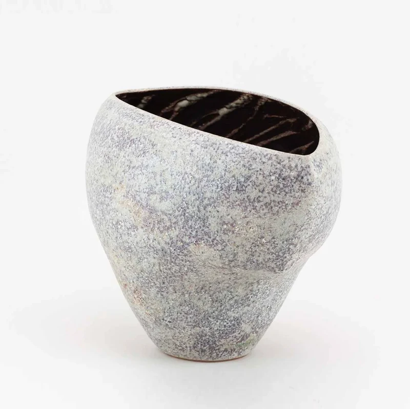 A Cloven Stoneware Bowl in Lilac and Grey Glaze by Chris Carter (B. 1945)