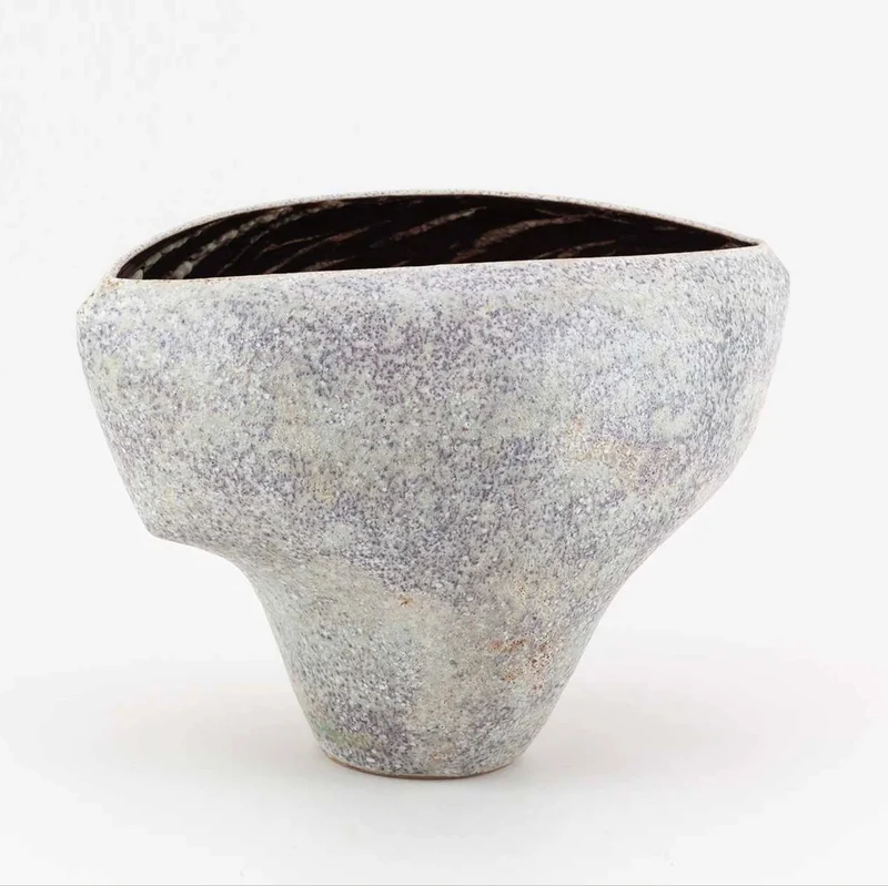 A Cloven Stoneware Bowl in Lilac and Grey Glaze by Chris Carter (B. 1945)