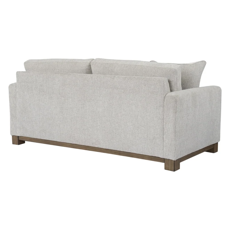 Sofa condo en tissu gris pâle avec coussins - MarinaMae