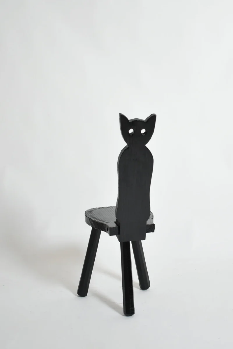 Pair of brutalist ebonised wood owl chairs, 1960s