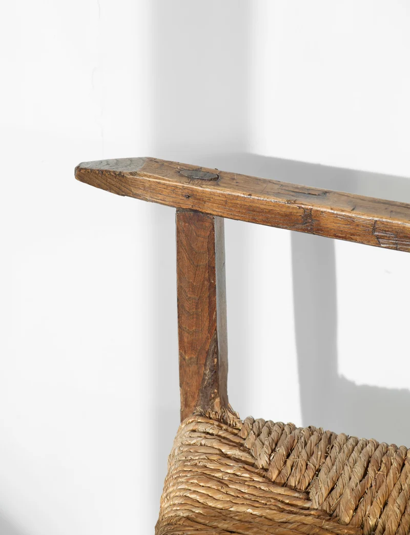A French folk bench from the 19th Century. Wood and straw