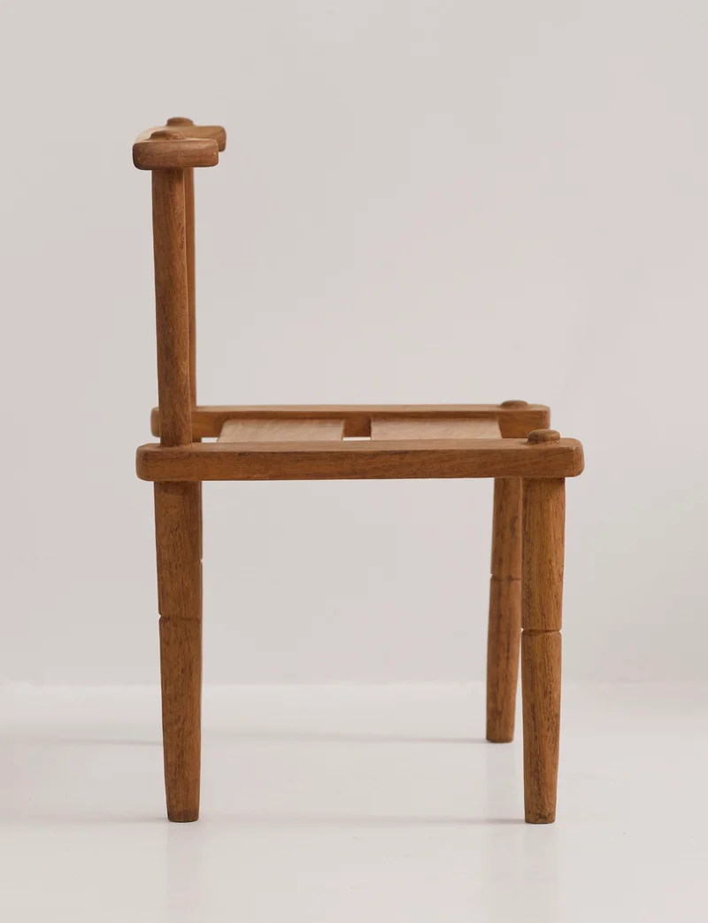 Large one-of-a-kind Baoulé chair in solid wood