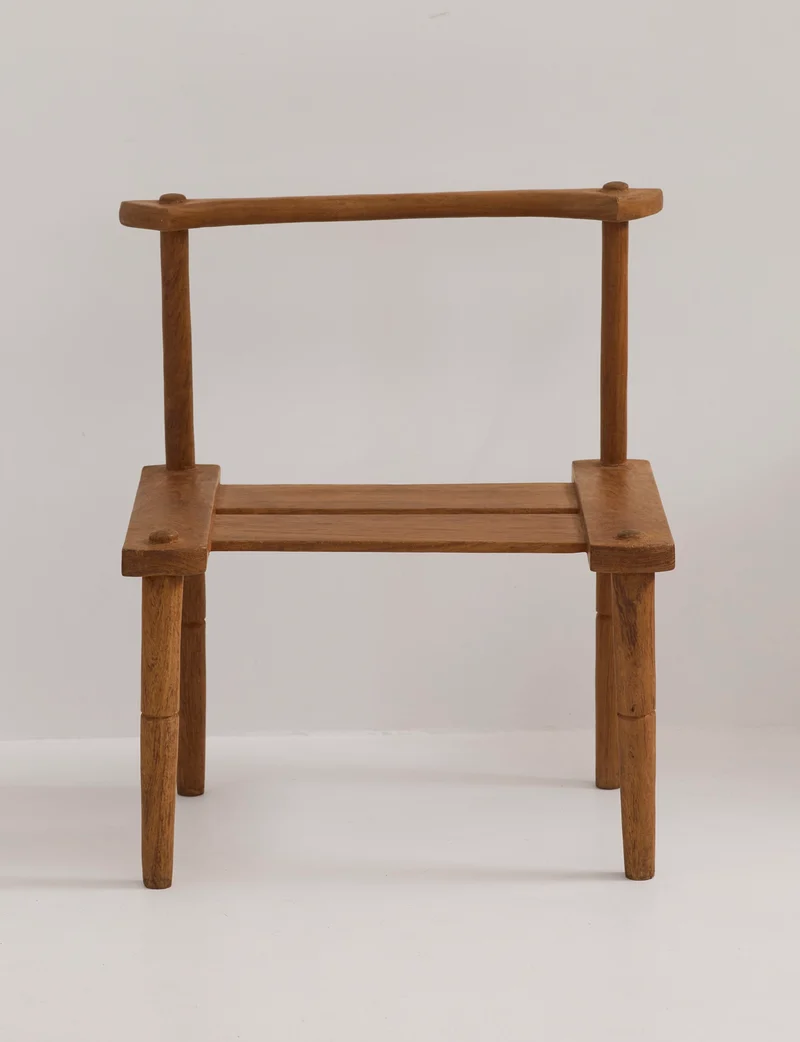Large one-of-a-kind Baoulé chair in solid wood